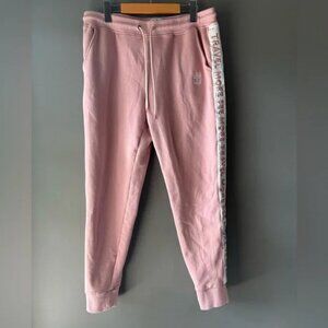 Royal Caribbean, size Large, pink cotton sweatpants, “travel more see more”
